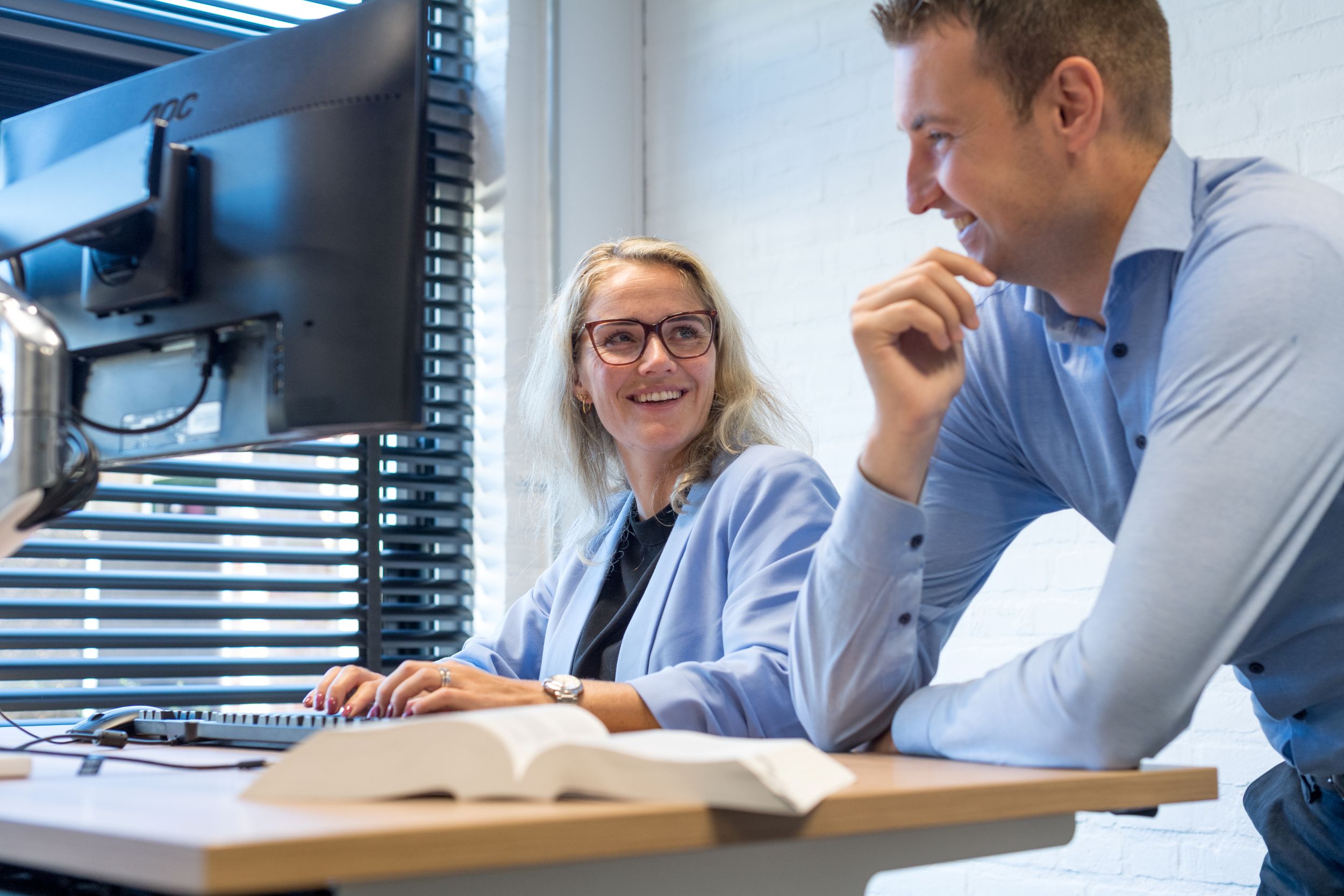 Werkoverleg aan bureau