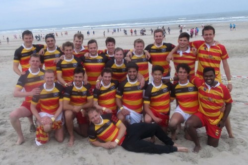 Rugby team on the beach