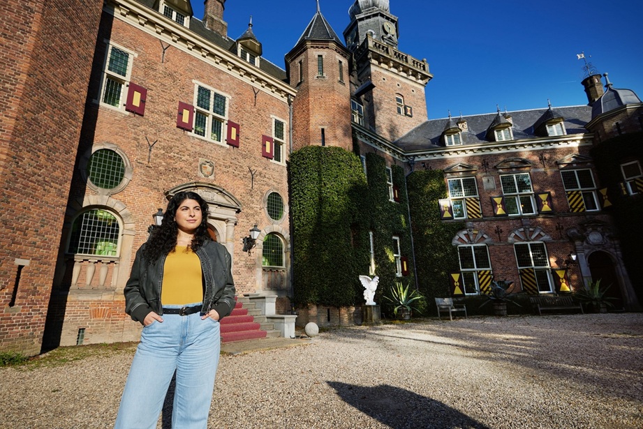 Student in front of castle